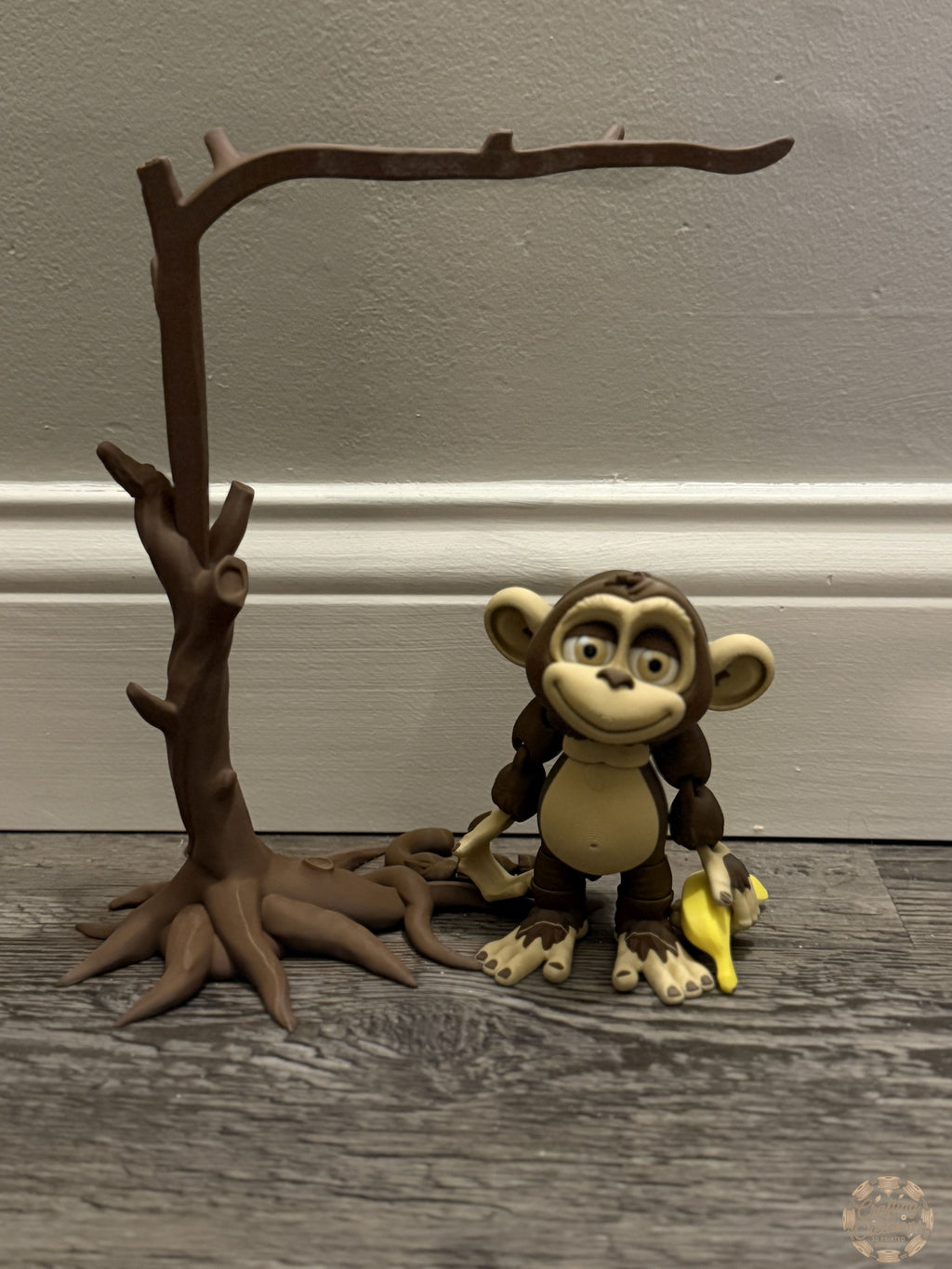 Monkey Hanging from Tree