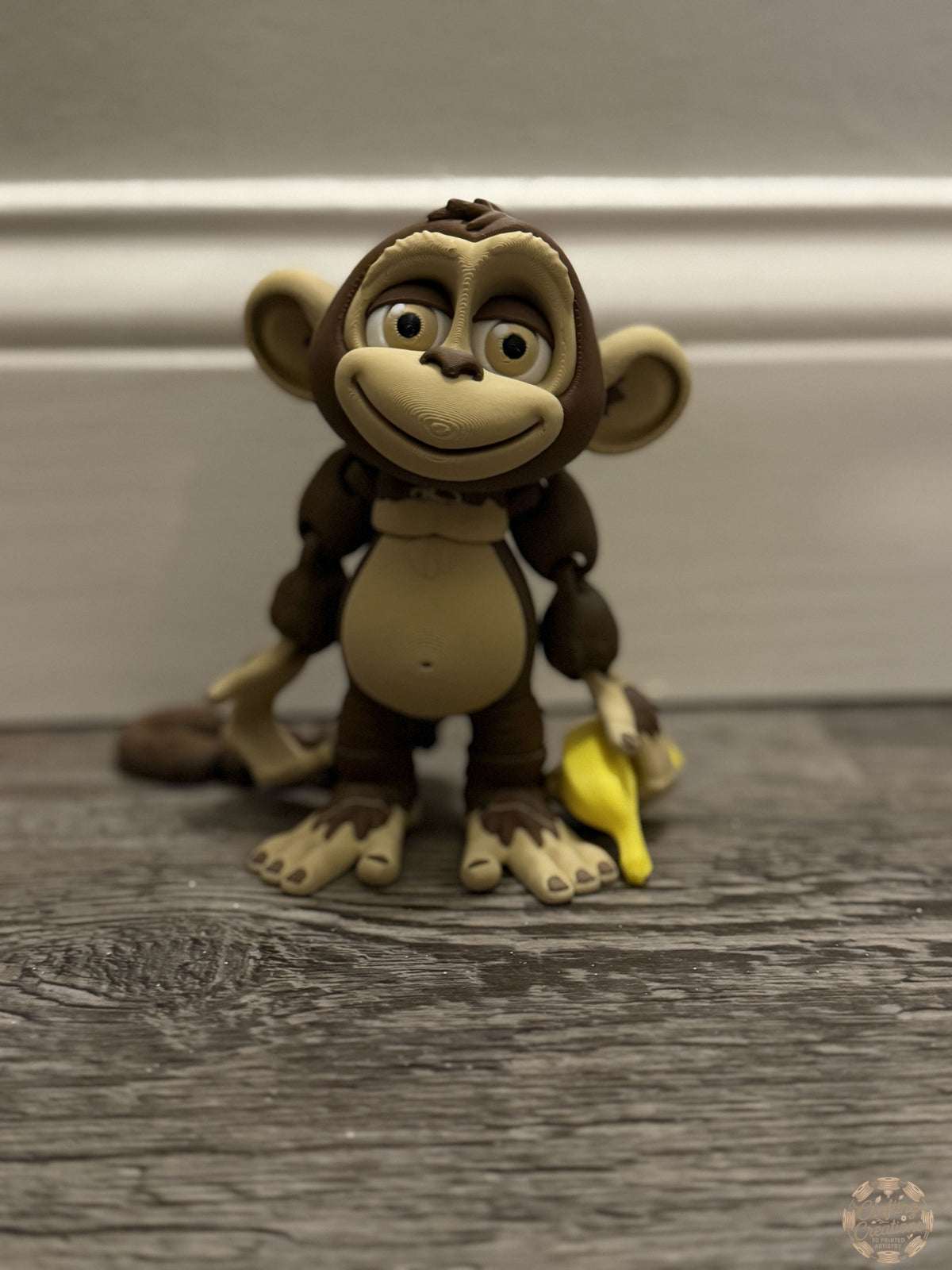 Monkey Hanging from Tree