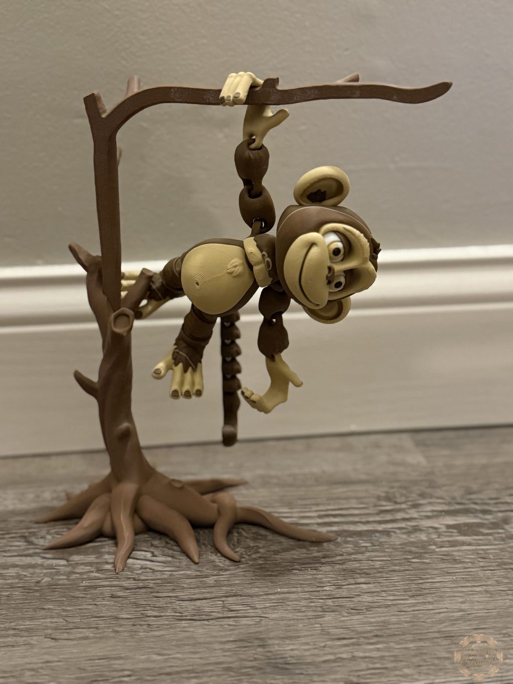 Monkey Hanging from Tree
