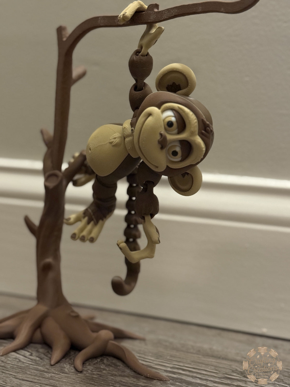 Monkey Hanging from Tree