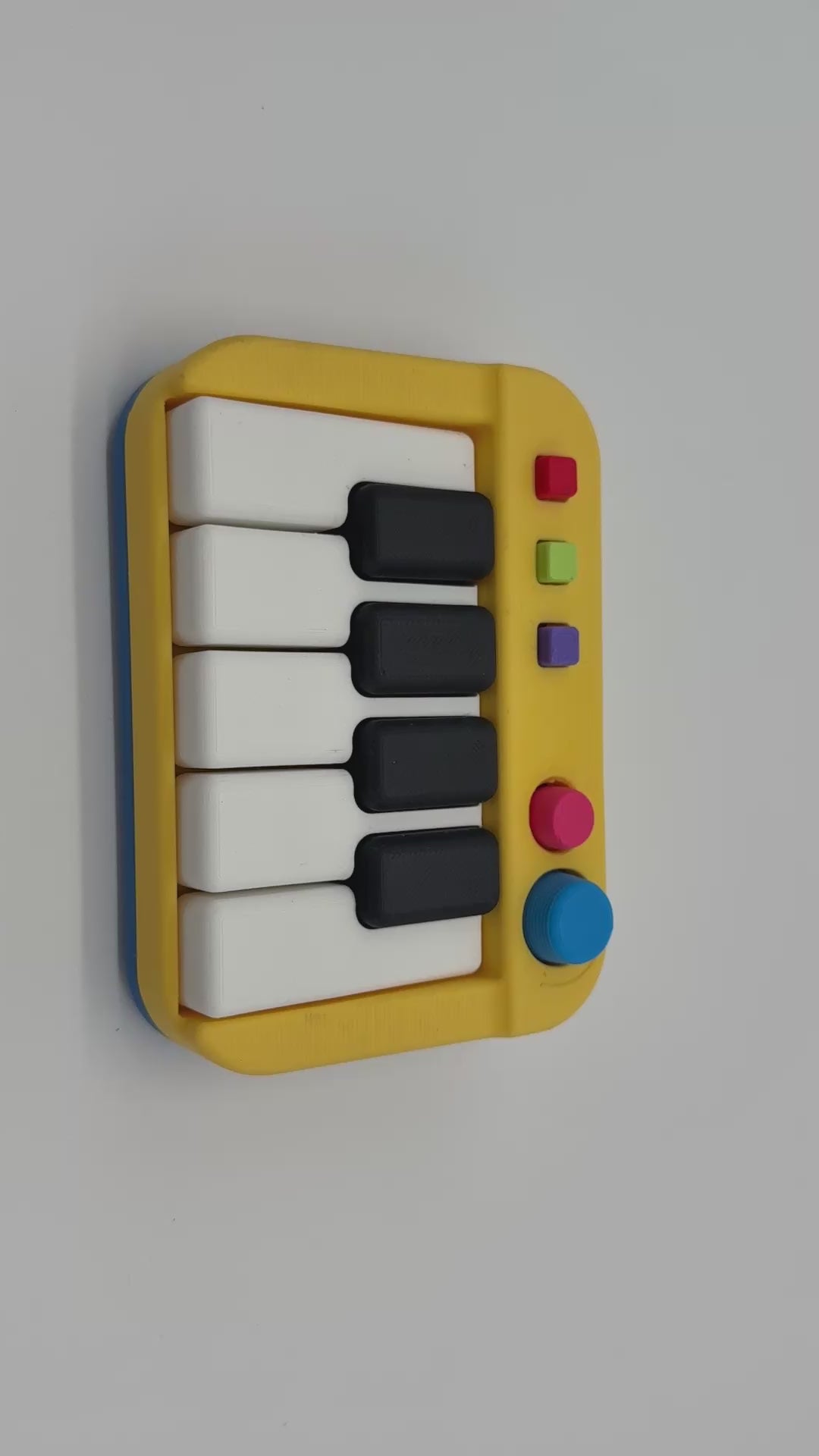 Mini piano-style clicker
